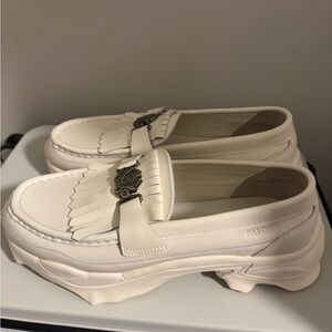 Puma White Loafers with Metal Accent